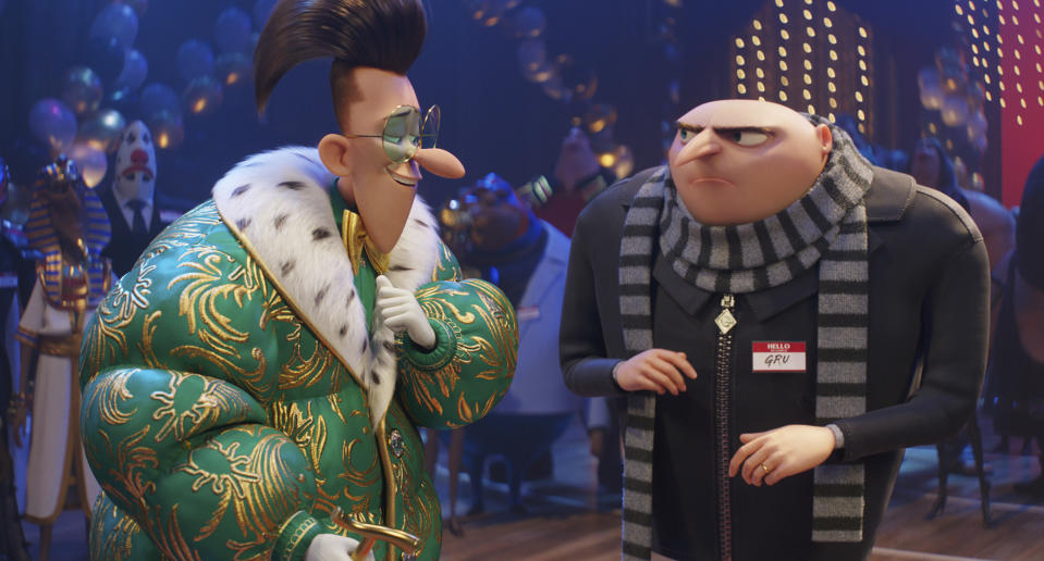 This image release by Illumination & Universal Pictures shows Maxime, voiced by Will Ferrell, left, and Gru, voiced by Steve Carell, in a scene from "Despicable Me 4," (Illumination & Universal Pictures via AP)