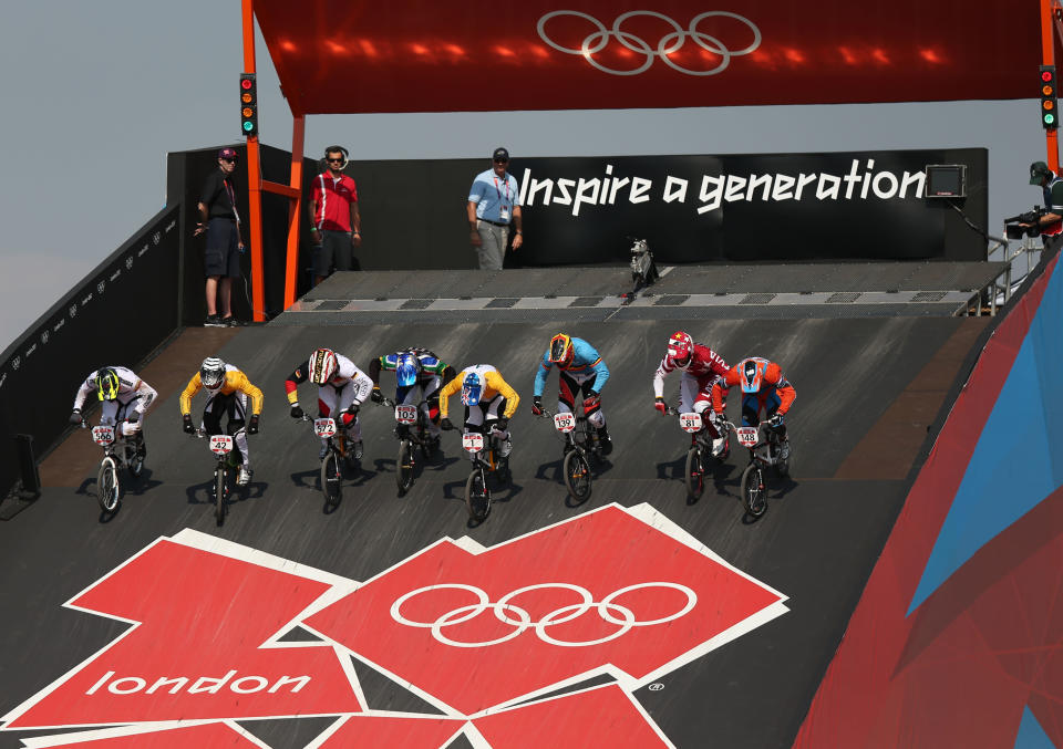 Riders exit the start gate and head down the starting ramp during the Men's BMX Cycling Quarter Finals on Day 13 of the London 2012 Olympic Games at BMX Track on August 9, 2012 in London, England. (Getty Images)