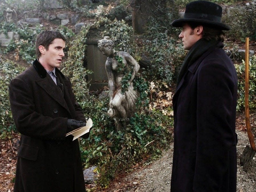 Christian Bale as Alfred Borden and Hugh Jackman as Robert Angier in "The Prestige."