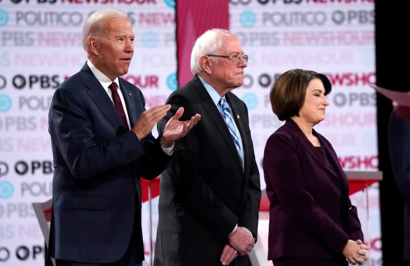 Candidates Biden, Sanders and Klobuchar before the sixth 2020 U.S. Democratic presidential candidates campaign debate at Loyola Marymount University in Los Angeles, California, U.S.