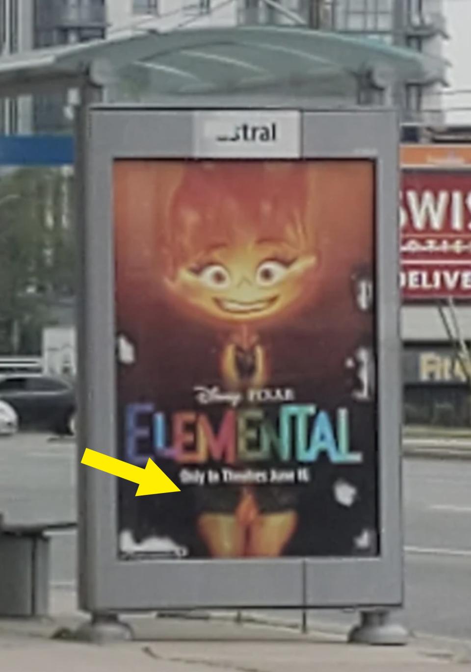 Arrow pointing at an "Elemental" poster