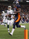 DENVER, CO - NOVEMBER 17: Cornerback Andre' Goodman #21 of the Denver Broncos returns an interception of a pass by quarterback Mark Sanchez #6 of the New York Jets 26 yards for a third quarter touchdown at Sports Authority Field at Mile High on November 17, 2011 in Denver, Colorado. (Photo by Doug Pensinger/Getty Images)