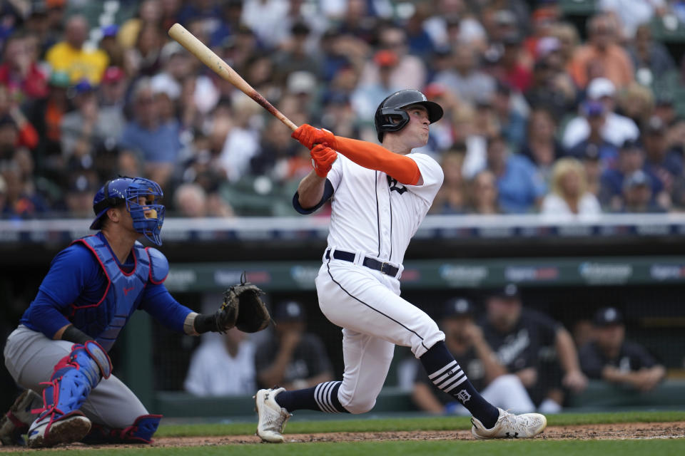 Detroit Tigers' Kerry Carpenter hits a grand slam against the Chicago Cubs in the sixth inning of a baseball game, Wednesday, Aug. 23, 2023, in Detroit. (AP Photo/Paul Sancya)