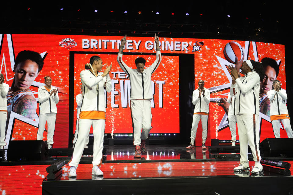 Phoenix Mercury's Brittney Griner, of Team Stewart, center, reacts as she is introduced before a WNBA All-Star basketball game Saturday, July 15, 2023, in Las Vegas. (AP Photo/John Locher)