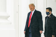 President Donald Trump walks on the North Portico as he leaves the White House, Sunday, Oct. 25, 2020, in Washington for a campaign rally in New Hampshire. (AP Photo/Manuel Balce Ceneta)