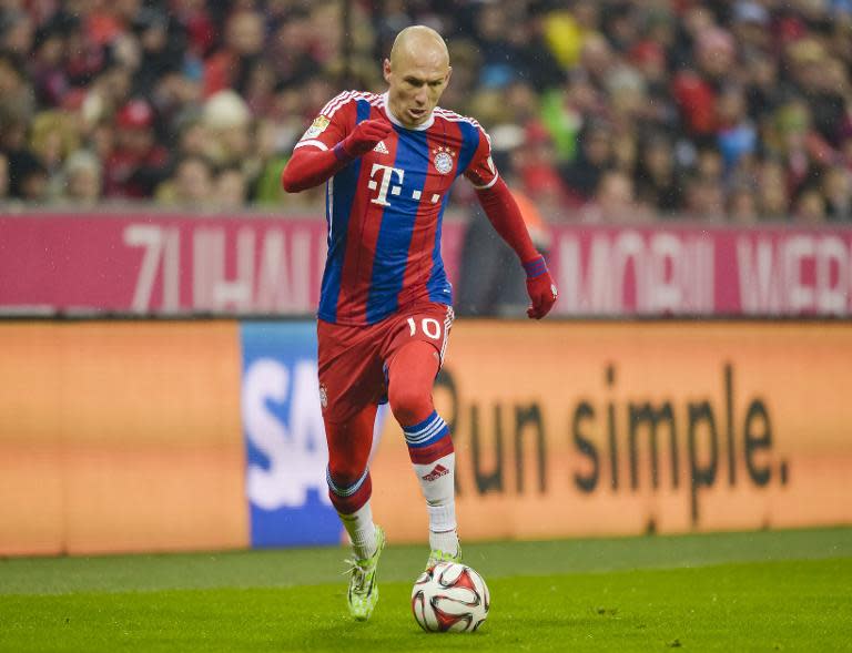 Bayern Munich's Dutch midfielder Arjen Robben plays the ball during the German first division Bundesliga football match FC Bayern Munich vs 1 FC Cologne in Munich, southern Germany, on February 27, 2015