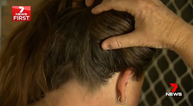 The 52-year-old was punched in the back of the head after she refused to cooperate. Photo: 7 News