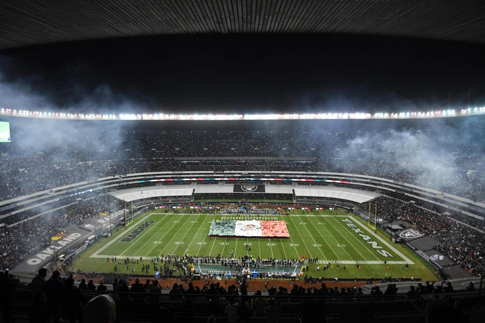 General overall view of a Mexican flag on the field during the playing of the Mexico national anthem before an NFL International Series game between the Houston Texans and the Oakland Raiders at Estadio Azteca in 2016.