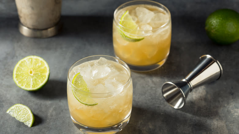 Two lime cocktails on counter