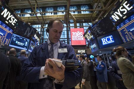 Traders work on the floor of the New York Stock Exchange April 11, 2014. REUTERS/Brendan McDermid