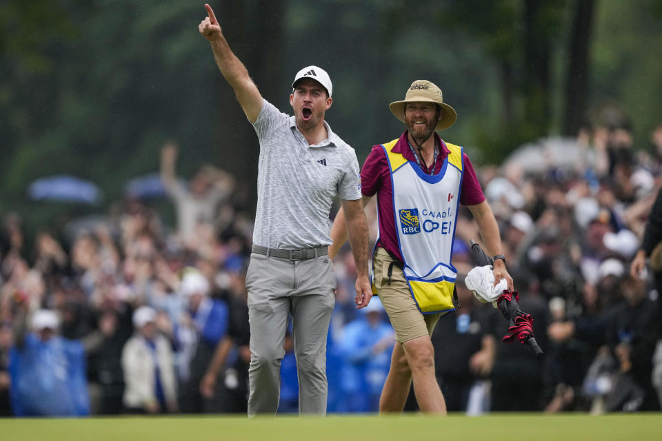 Nick Taylor, of Canada, celebrates after winning the Canadian Open golf tournament in Toronto, Sunday, June 11, 2023. (Andrew Lahodynskyj/The Canadian Press via AP)