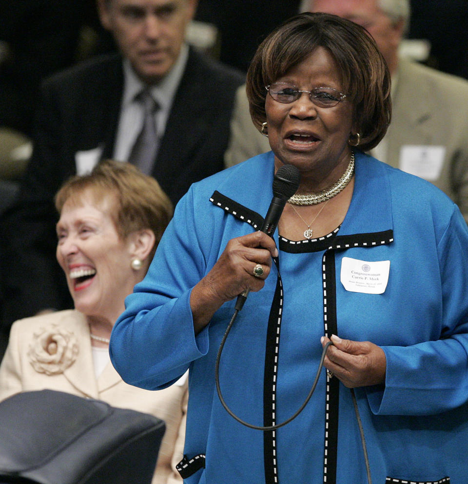 FILE - Former Florida Congresswoman Carrie Meek cracks up Betty Castor, left as she recalls her time serving in the legislature on senate reunion day, March 20, 2008 in Tallahassee, Fla. Meek, the grandchild of a slave and a sharecropper’s daughter who became one of the first black Floridians elected to Congress since Reconstruction, died Sunday, Nov. 28, 2021. She was 95. (AP Photo/Steve Cannon)