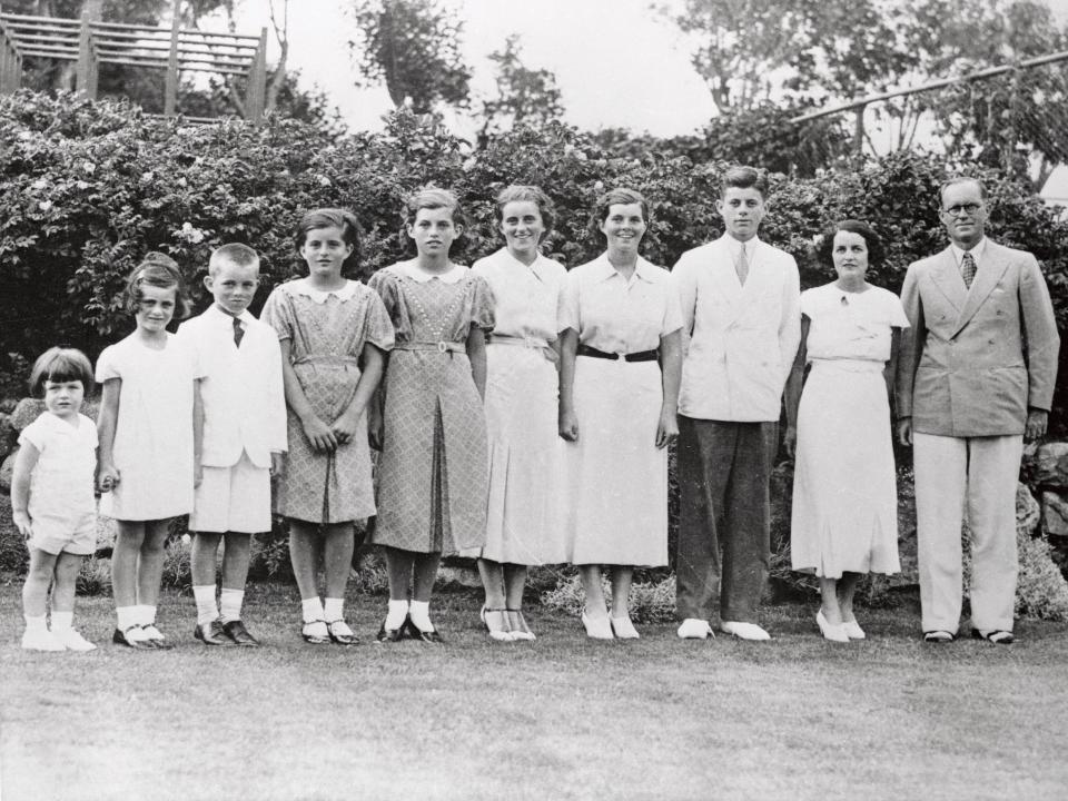 John F. Kennedy poses for a photograph with his family at their Boston home on July 8th, 1934.