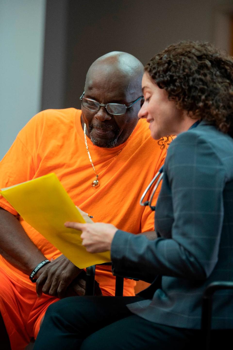 Richard Hennie, who has diabetes, consults with Dr. Jennifer Goldman, his primary care physician at Memorial Healthcare System.