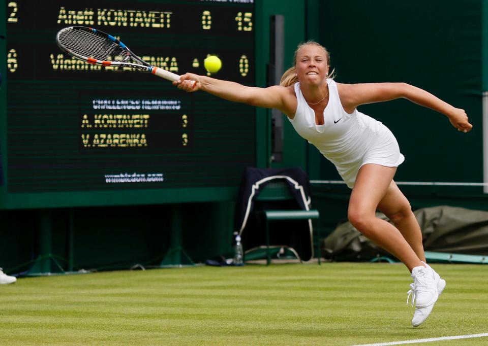Anett Kontaveit competes against Victoria Azarenka at Wimbledon in 2015.