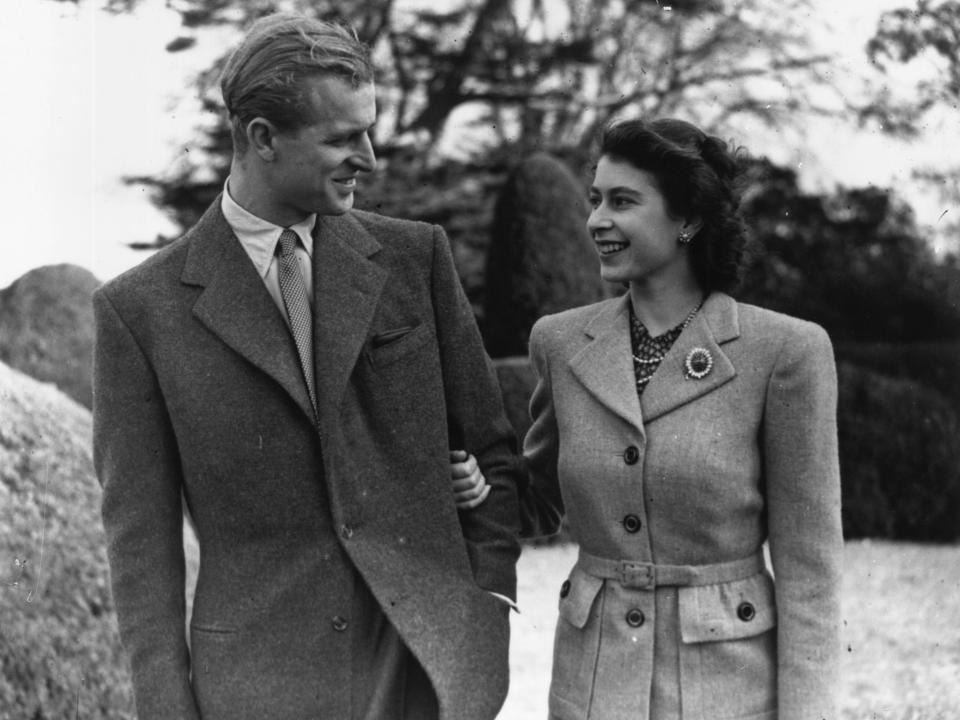 A black and white photo of Queen Elizabeth II and Prince Philip on their honeymoon in 1947.
