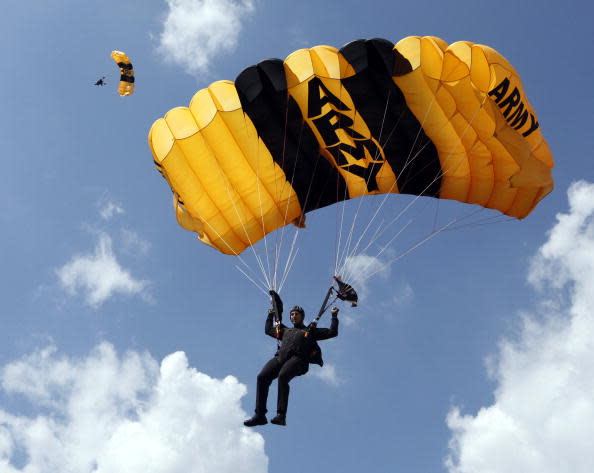 The U.S. Army's Golden Knights float into Wallace Wade Stadium in Durham, North Carolina, on Saturday, September 25, 2010. Army went on to defeat host Duke, 35-21. (Chuck Liddy/Raleigh News & Observer/MCT via Getty Images)