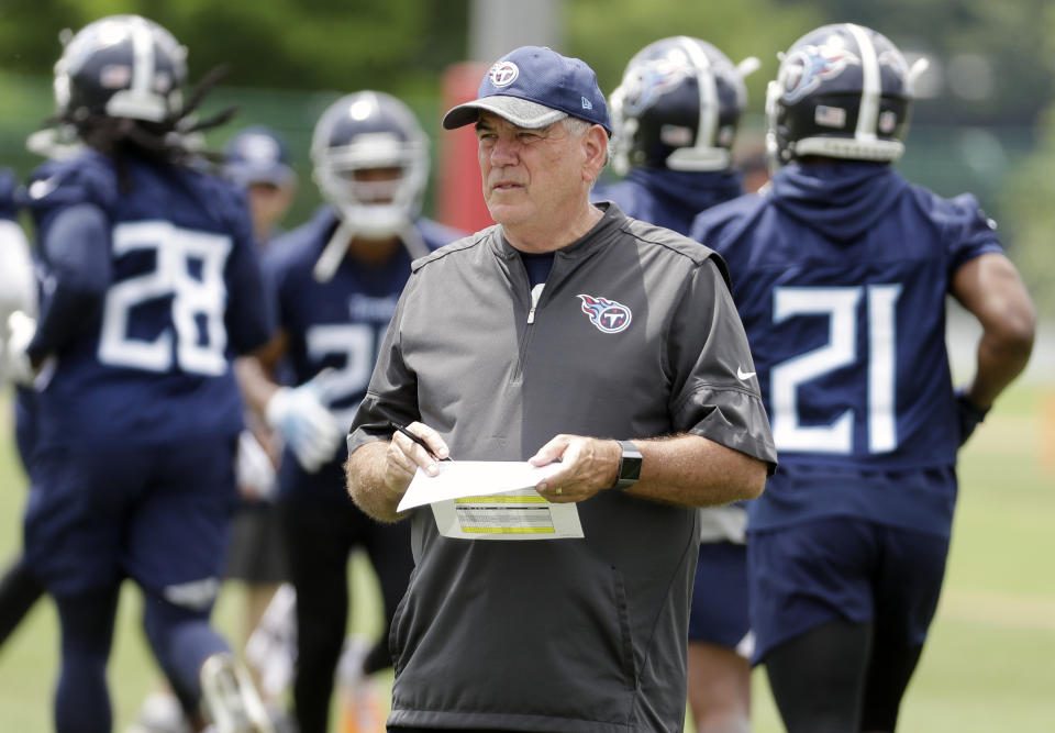 FILE- In this May 30, 2018, file photo, Tennessee Titans defensive coordinator Dean Pees watches duringNFL football training facility in Nashville, Tenn. Arthur Smith, the new Atlanta Falcons coach, has started building his staff by hiring offensive coordinator Dave Ragone, defensive coordinator Dean Pees and special teams coach Marquice Williams. (AP Photo/Mark Humphrey, File)