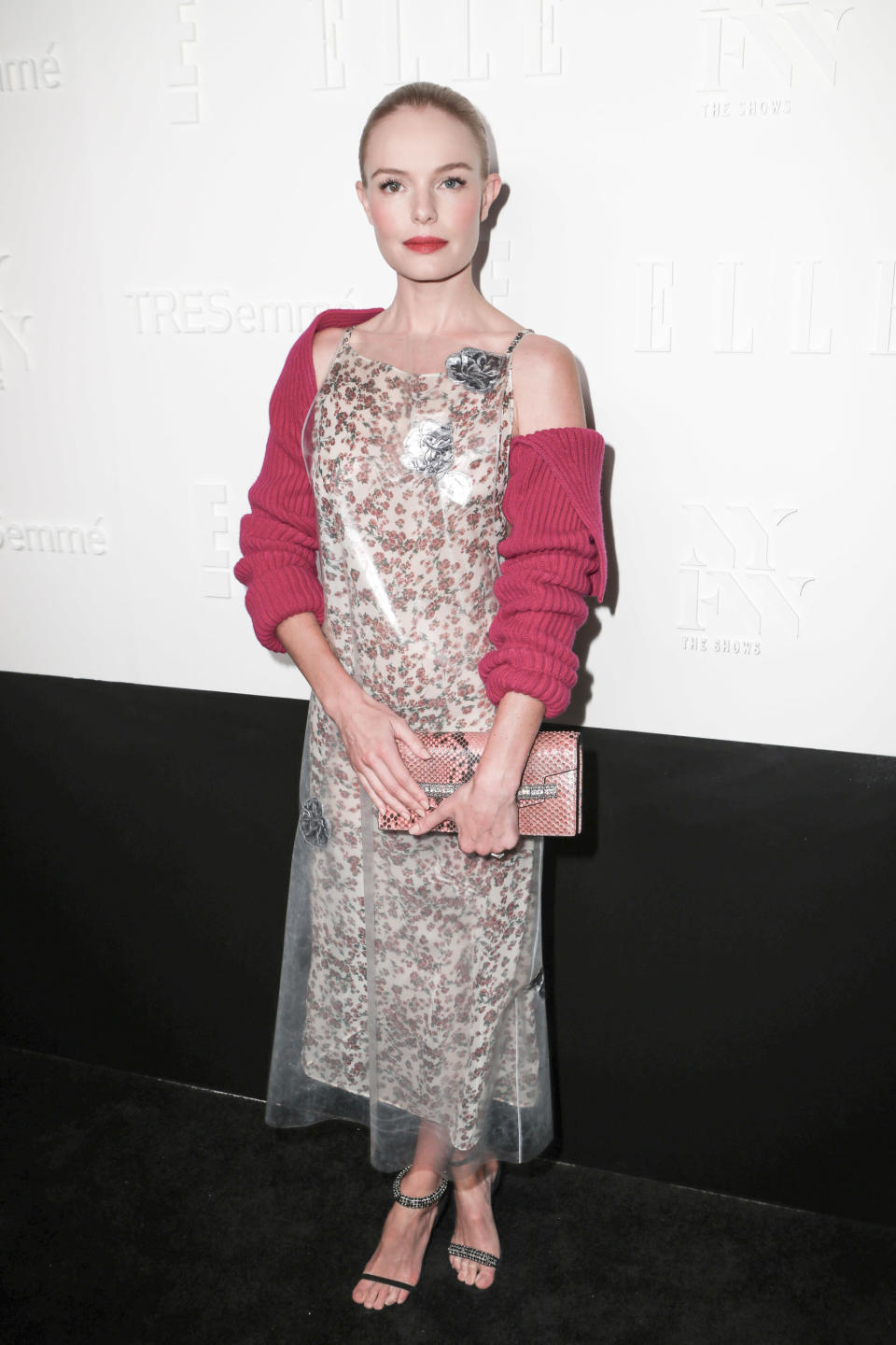 <p>The actress teamed a tulle, embellished dress with an oversized pink knit for the Kickoff Party </p>