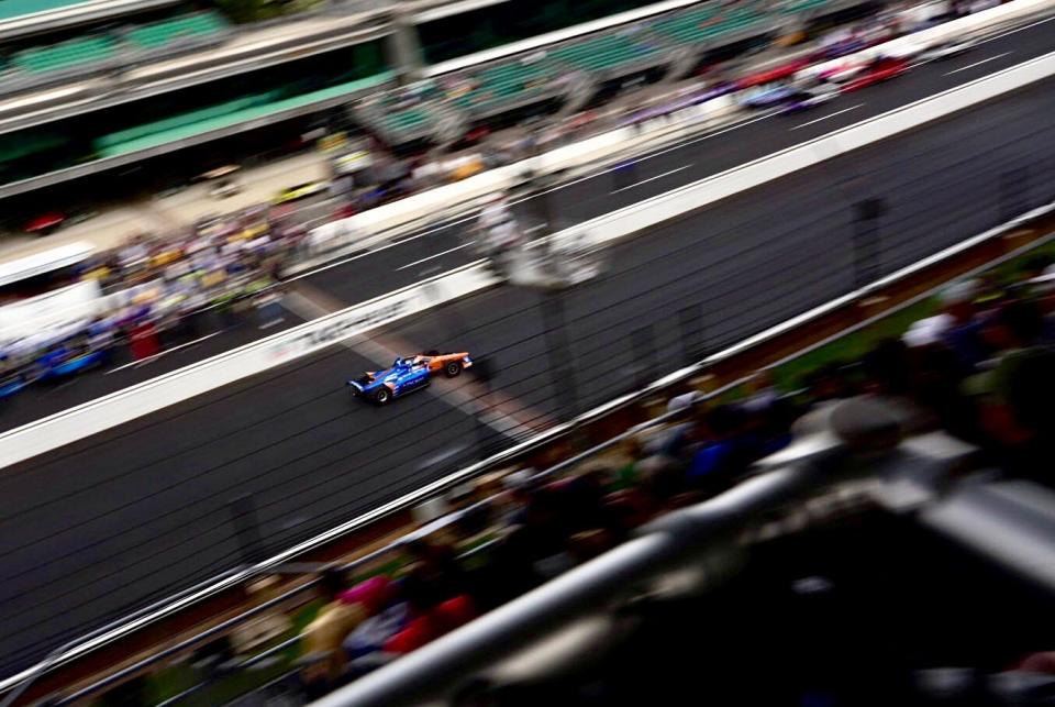 Chip Ganassi Racing driver Scott Dixon (9) crosses the yard of bricks to claim the pole Sunday, May 22, 2022, during the second day of qualifying for the 106th running of the Indianapolis 500 at Indianapolis Motor Speedway