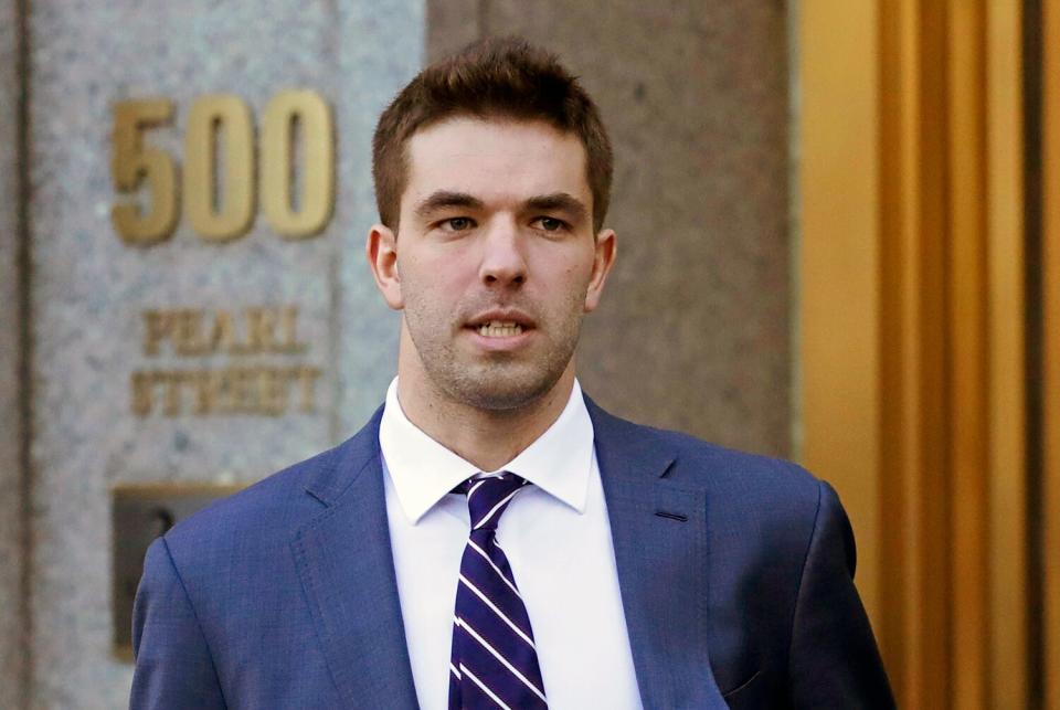 In this March 6, 2018 file photo, Billy McFarland, the promoter of the failed Fyre Festival in the Bahamas, leaves federal court after pleading guilty to wire fraud charges in New York. More than three years after the highly publicized Fyre Festival famously fizzled out in the Bahamas, merchandise and other "minor assets" are available for purchase, courtesy the U.S. Marshals Service from Texas-based Gaston &amp; Sheehan Auctioneers.