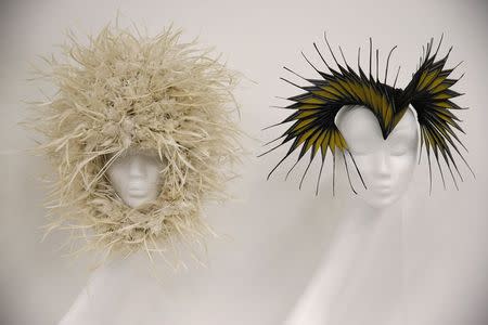 Headpieces from 2009 worn by Lady Gaga and made by Philip Treacy are displayed in the "Women Fashion Power exhibition at the Design Museum in London November 4, 2014. REUTERS/Suzanne Plunkett