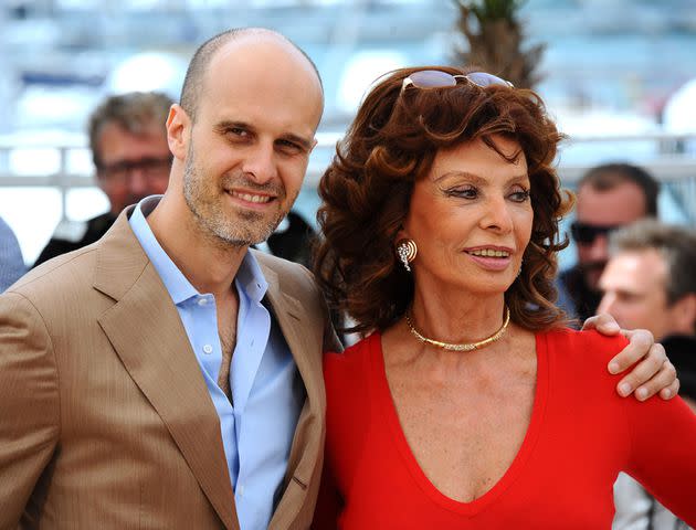 <p>Anthony Harvey/FilmMagic</p> Edoardo Ponti and mom Sophia Loren at the 67th Annual Cannes Film Festival in 2014