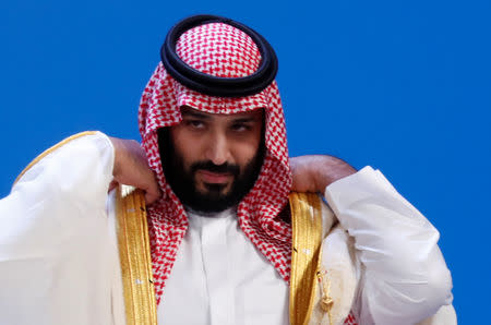 Saudi Crown Prince Mohammed bin Salman prepares for a family photo during the G20 leaders summit in Buenos Aires, Argentina November 30, 2018. REUTERS/Kevin Lamarque