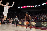 Stanford forward Harrison Ingram, right, gets set to shoot as Southern California guard Drew Peterson defends during the first half of an NCAA college basketball game Thursday, Jan. 27, 2022, in Los Angeles. (AP Photo/Mark J. Terrill)