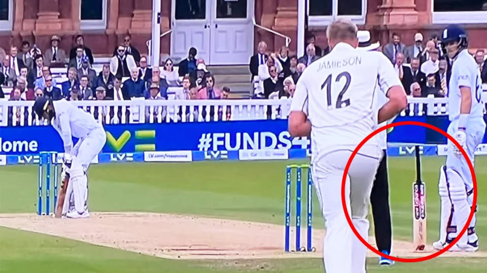 Pictured right, Joe Root's bat somehow remains upright despite the England star not holding onto it.