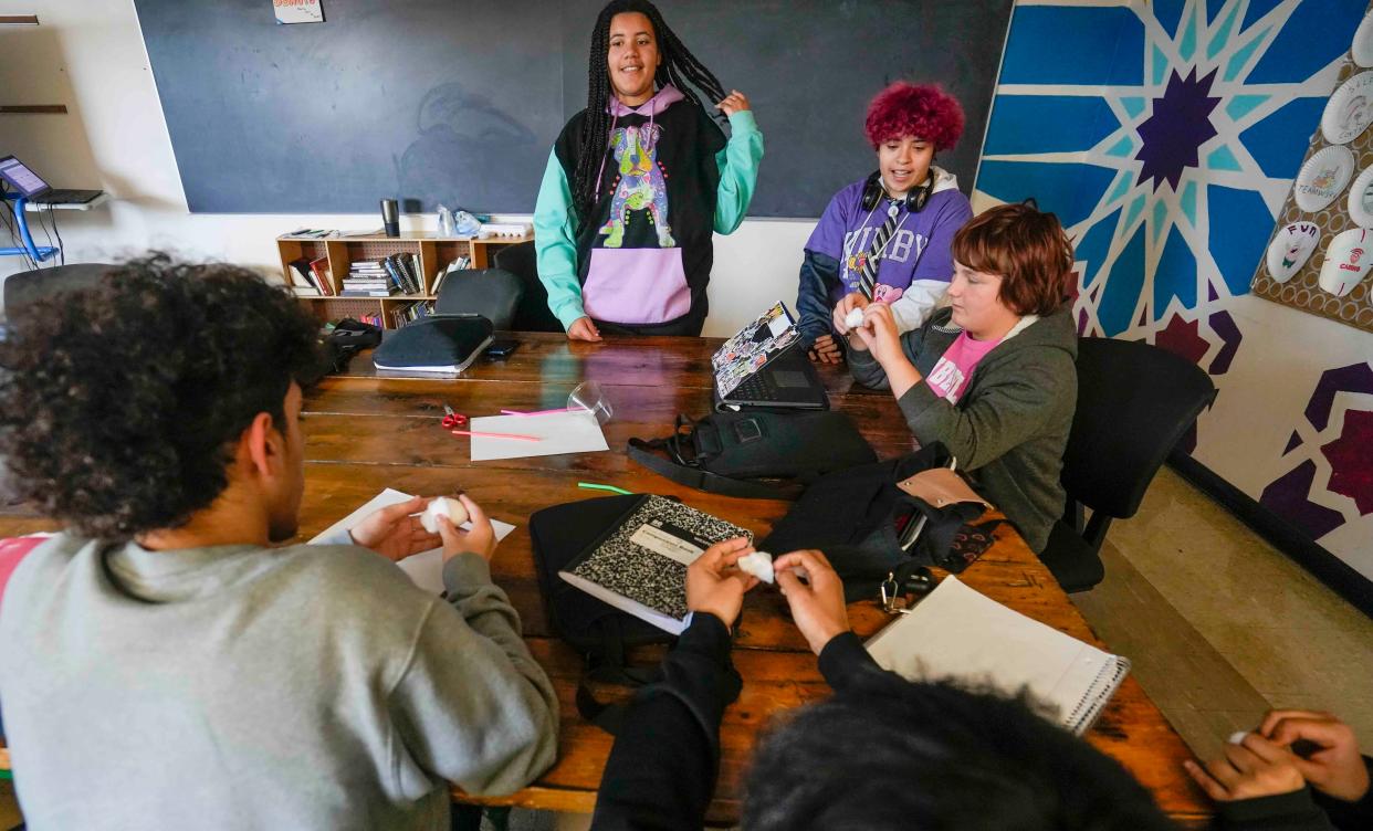 From left, Jeren Pagan, Jaida Campbell, Liam Aponte and Austin Stegall work together during the Restorative Practices class to find a way to protect an egg after it drops from a cup.