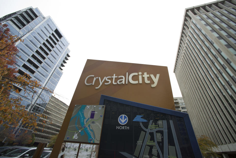 FILE - This Nov. 13, 2018, file photo shows a sign of a street map for Crystal City neighborhood of Arlington, Va. Protesters repeatedly shouted "shame" as a northern Virginia county board Saturday unanimously approved a $23 million incentives package for Amazon to build a new headquarters there. (AP Photo/Cliff Owen, File)