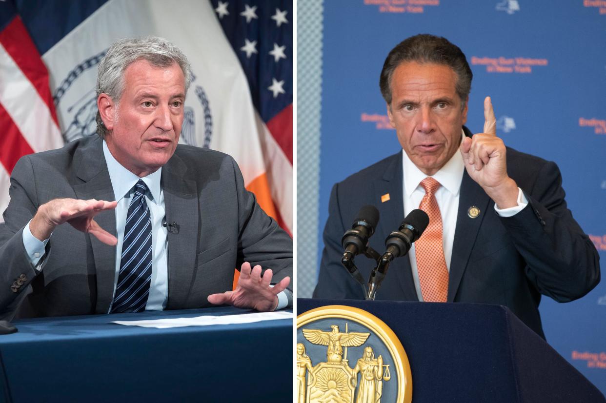 New York City Mayor Bill de Blasio (left) and New York Gov. Andrew Cuomo (right)