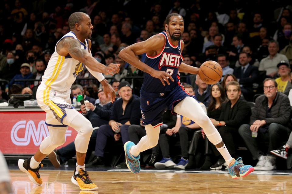 Andre Iguodala (left) helped to limit Kevin Durant to just 19 points on 6-of-19 shooting from the field.