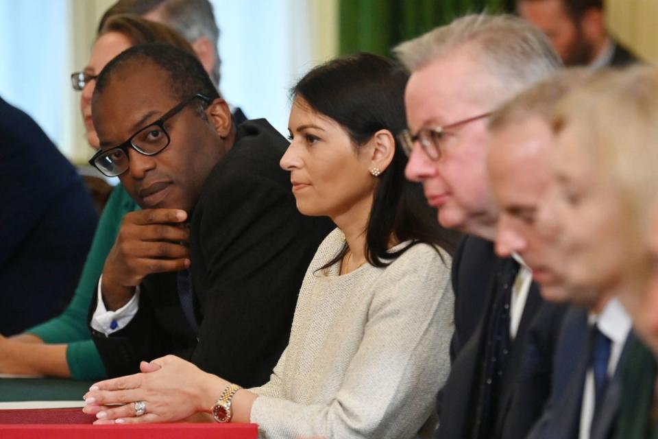 Former Business Secretary Kwasi Kwarteng alongside Home Secretary Priti Patel (PA)