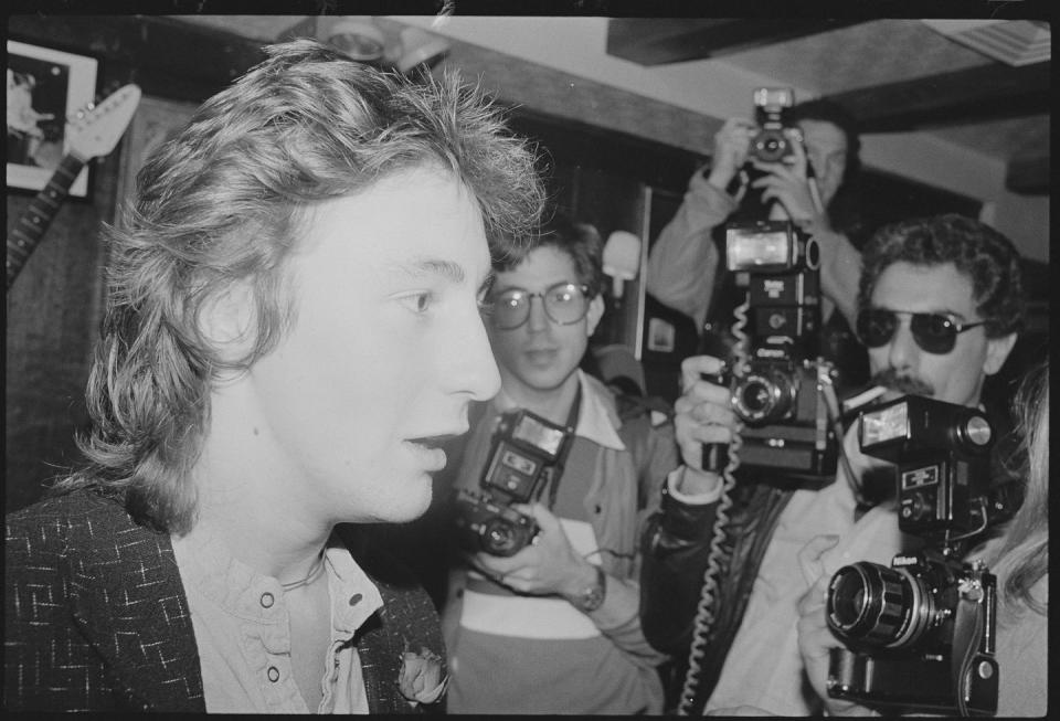 julian lennon with reporters