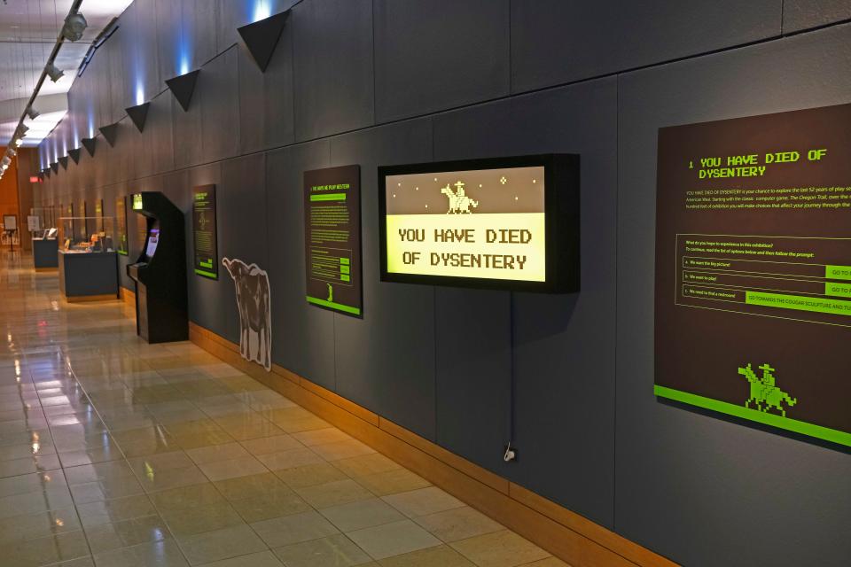 An accompanying exhibit to "Playing Cowboy," which features Western toys, books and games for children, "You Have Died of Dysentery" highlights Western games, books and videos after 1970 at the National Cowboy & Western Heritage Museum Friday, March 24, 2023, in Oklahoma City.