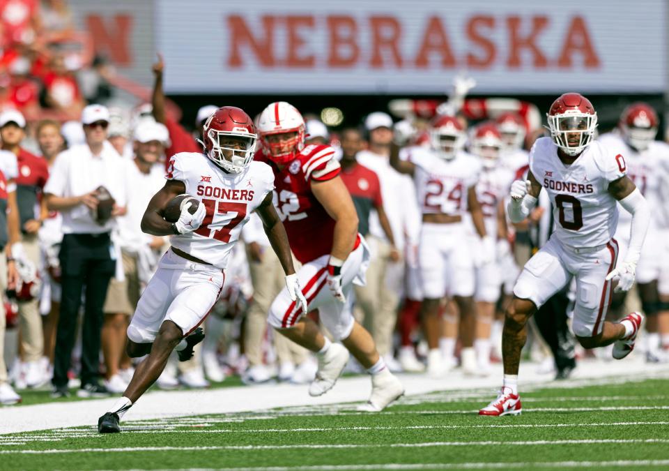 Oklahoma's Marvin Mims (17) returns a punt against Nebraska last Saturday in Lincoln.