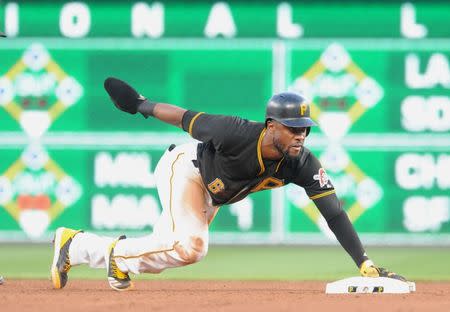 Jul 9, 2018; Pittsburgh, PA, USA; Pittsburgh Pirates base runner Starling Marte (6) steals second base in the fourth inning against the Washington Nationals at PNC Park. Mandatory Credit: Philip G. Pavely-USA TODAY Sports