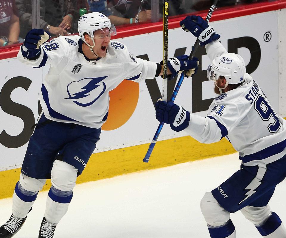 Tampa Bay Lightning left wing Ondrej Palat (left) celebrates his go-ahead goal against the Colorado Avalanche with center Steven Stamkos.