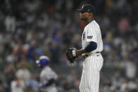 New York Yankees starting pitcher Domingo German reacts as New York Mets' Pete Alonso runs the bases after hitting a home run during the sixth inning of a baseball game, Tuesday, July 25, 2023, in New York. (AP Photo/Frank Franklin II)
