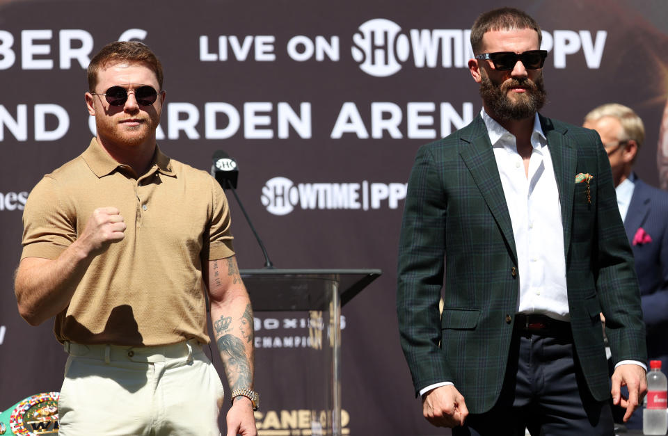 BEVERLY HILLS, CALIFORNIA - SEPTEMBER 21:  (L-R) Canelo Alvarez and Caleb Plant during a face-off before a press conference ahead of their super middleweight fight on November 6 at The Beverly Hilton on September 21, 2021 in Beverly Hills, California. (Photo by Ronald Martinez/Getty Images)