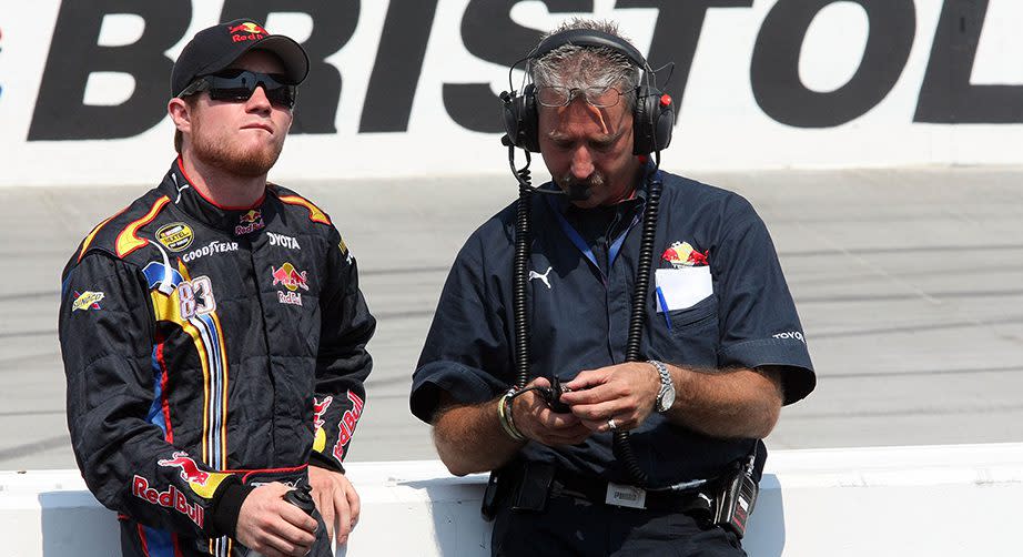 BRISTOL, TN - AUGUST 24: Brian Vickers (L), driver of the #83 Red Bull Toyota, talks with crew chief Doug Richert during qualifying for the NASCAR Nextel Cup Series Sharpie 500 at Bristol Motor Speedway on August 24, 2007 in Bristol, Tennessee. (Photo by John Harrelson/Getty Images for NASCAR) | Getty Images