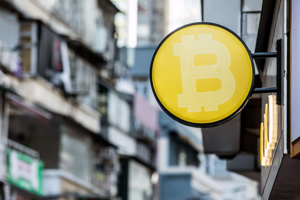 The Bitcoin logo in Hong Kong, China, on Wednesday, Dec. 21, 2022. Photographer: Paul Yeung/Bloomberg