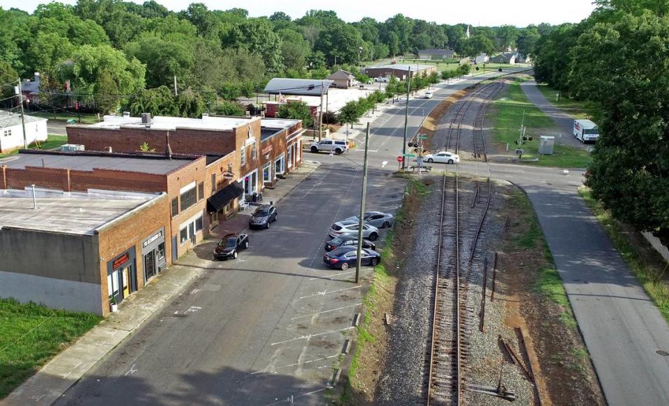 Railroad tracks owned by the Norfolk Southern Corp. down Main St. in Huntersville on Thursday, July 1, 2021.