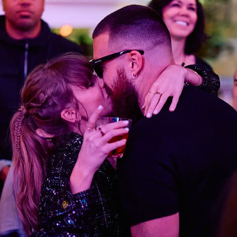 <p>Mike Kirschbaum</p> Taylor Swift and Travis Kelce at a Super Bowl afterparty at XS in Wynn Las Vegas on Feb. 11, 2024