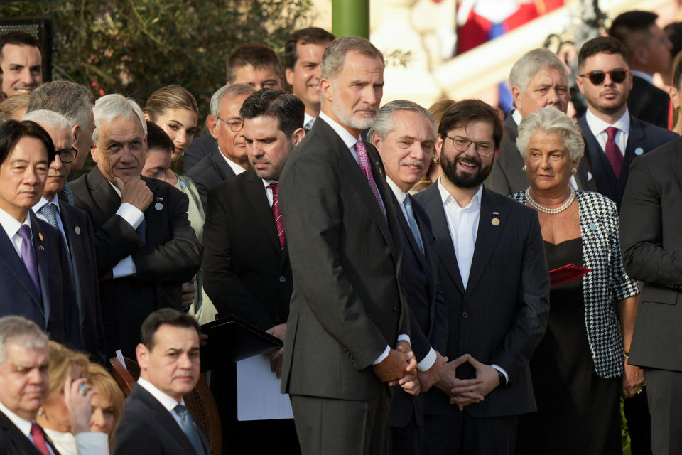 Spain's King Felipe, front center, Argentina's President Alberto Fernandez, behind center, Chile's President Gabriel Boric, behind center right, and Chile's former President Sebastian Pinera, behind fourth from left, attend the inauguration of Paraguay's President Santiago Pena in Asuncion, Paraguay, Tuesday, Aug. 15, 2023. (AP Photo/Jorge Saenz)