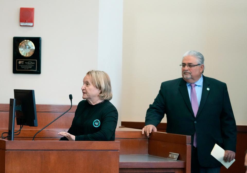 DeBary Mayor Karen Chasez and City Manager Carmen Rosamonda talk with lawmakers during Monday's Volusia County Legislative Delegation meeting in DeLand. City officials from Oak Hill to Ormond Beach approached lawmakers with requests for funding assistance during the session that starts March 7.