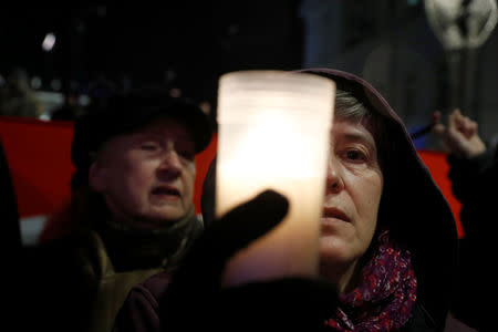 People gather in front of the Presidential Palace during a protest against judicial reforms in Warsaw, Poland, November 24, 2017. REUTERS/Kacper Pempel