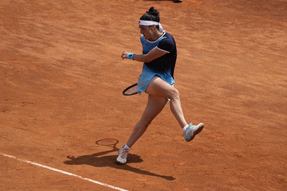 Turkey's Ons Jabeur reacts after loosing a point during her final match against Poland's Iga Swiatek at the Italian Open tennis tournament, in Rome, Sunday, May 15, 2022. (AP Photo/Alessandra Tarantino)